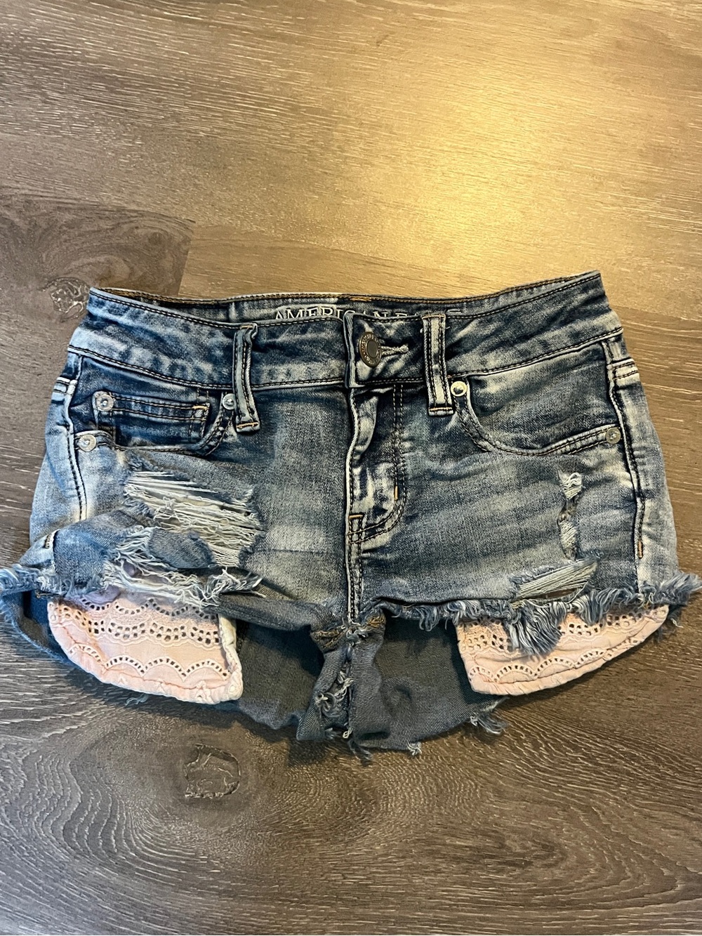 American Eagle Outfitters Blue Distressed Denim Shorts with Lace Trim size 00